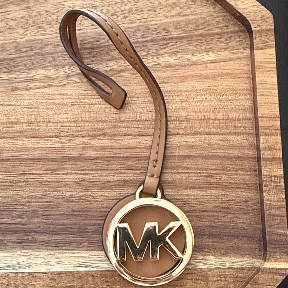 Michael Kors Brown and Gold bag tag